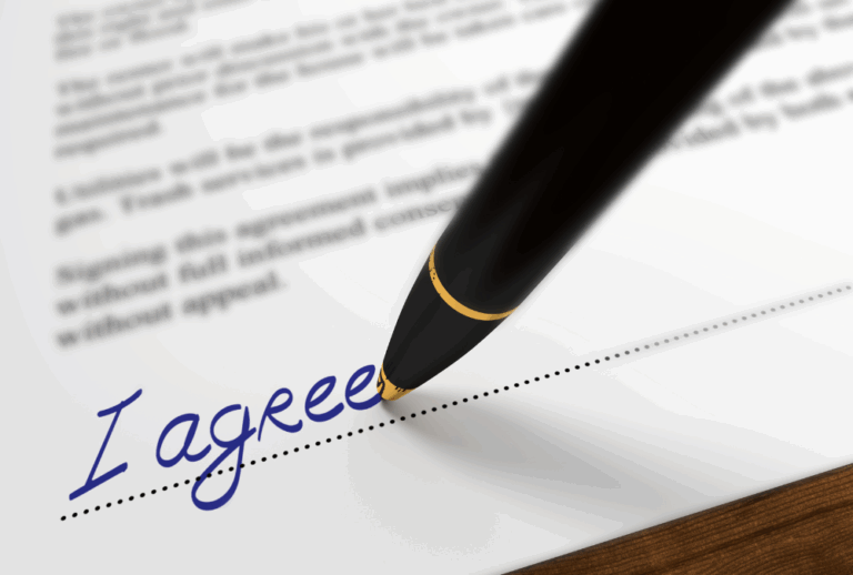 Image is of a contract being signed concept of are Franklin postnuptial agreements enforceable?