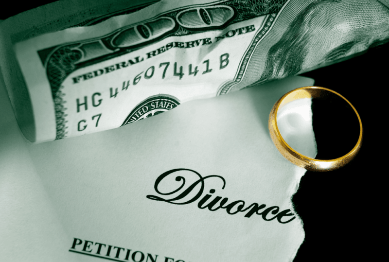 Image is of a divorce paper, wedding band, and crumpled American money, concept of finding hidden assets during a divorce in Franklin