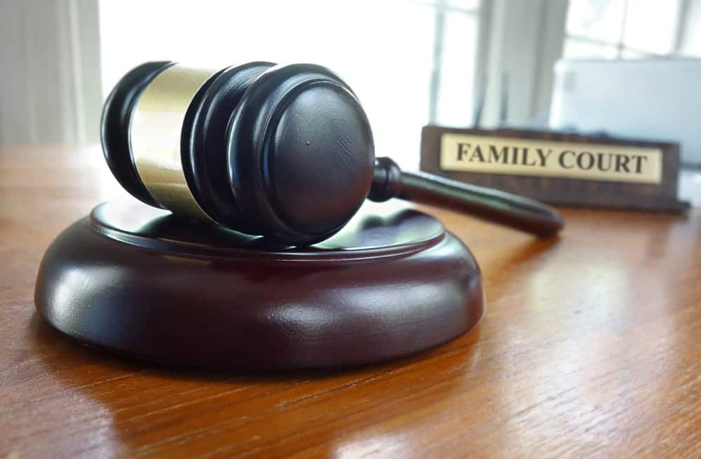 Image is of a judge’s gavel on a desk in family court, representing legal proceedings in divorce cases in Franklin